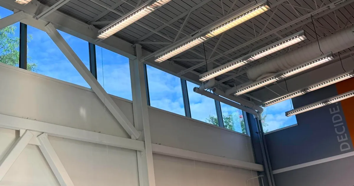 High gym windows below exposed roof framing at the Wilmington Jewish Community Center